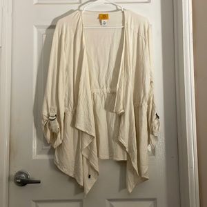 An off white cream colored cardigan/sweater. Only worn twice